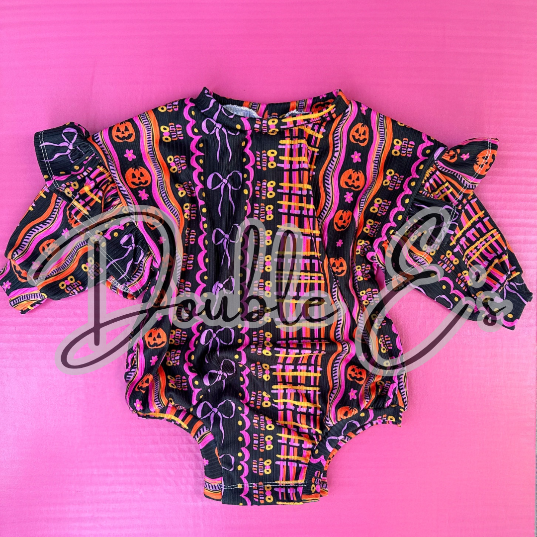 Sweater romper with snaps